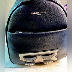 Karl Lagerfeld black backpack. KL featured on front.